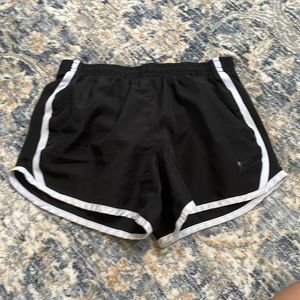 Black and white athletic style shorts. Size medium (petite)